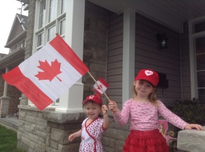 My niece's two little girls greet Canada Day.